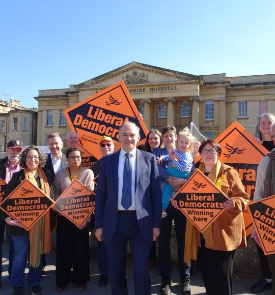 Photo is of Lib Dem Leader Ed Davey and Reading Lib Dems outside the RBH.